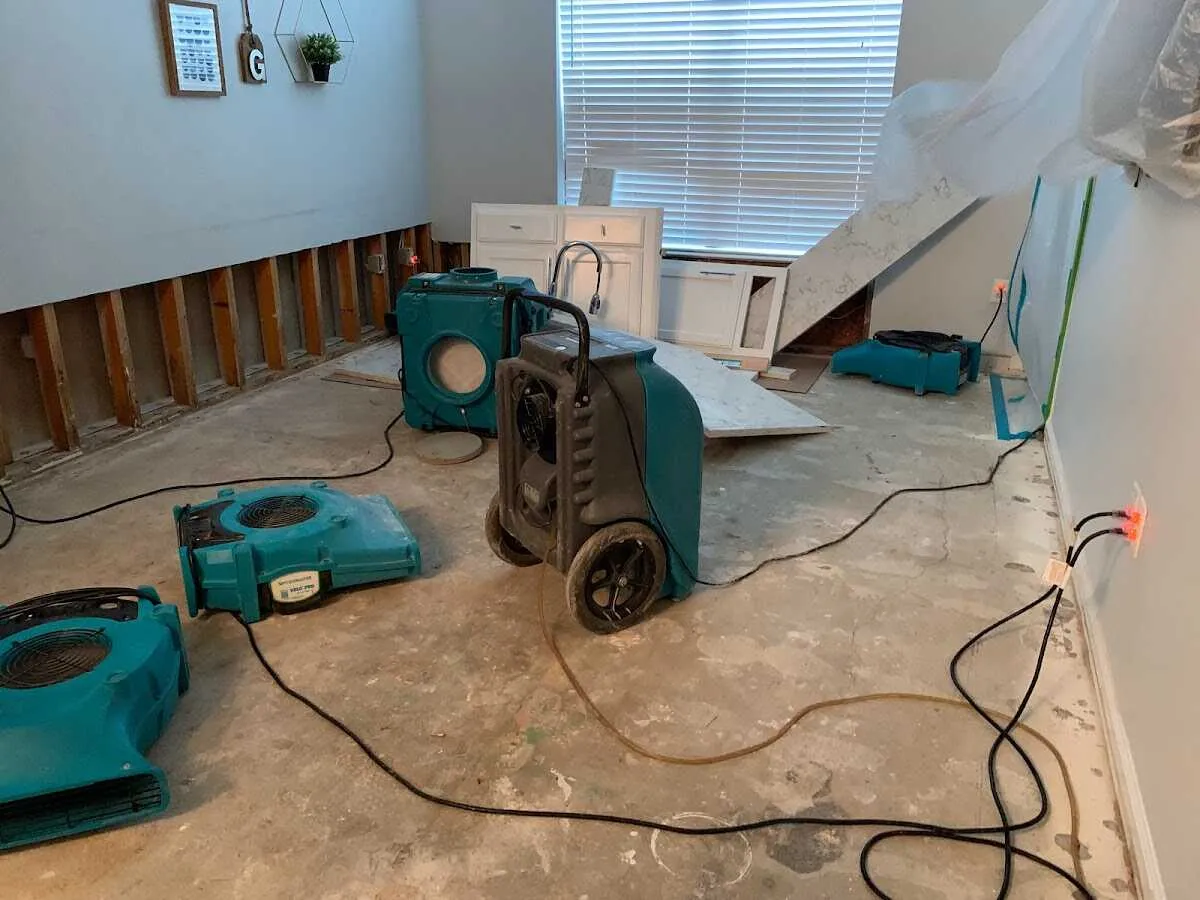Dehumidifier in flood-cut room for Water Damage Restoration in Ware